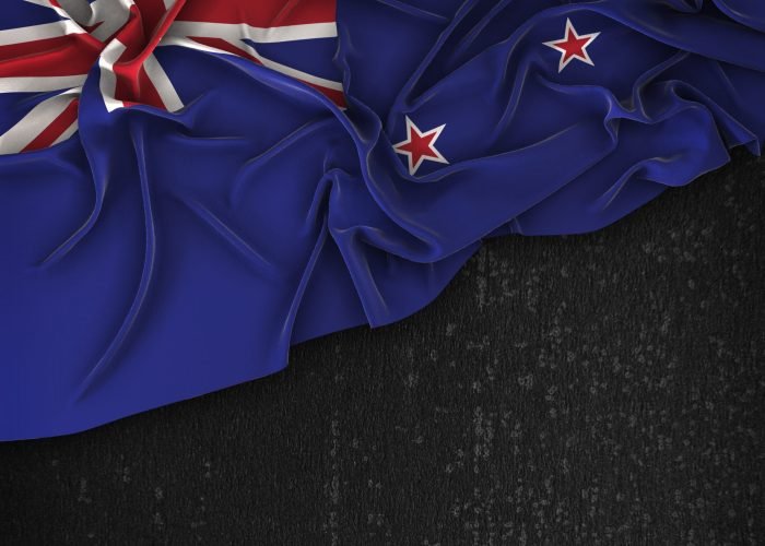 New Zealand Flag Vintage on a Grunge Black Chalkboard With Space For Text